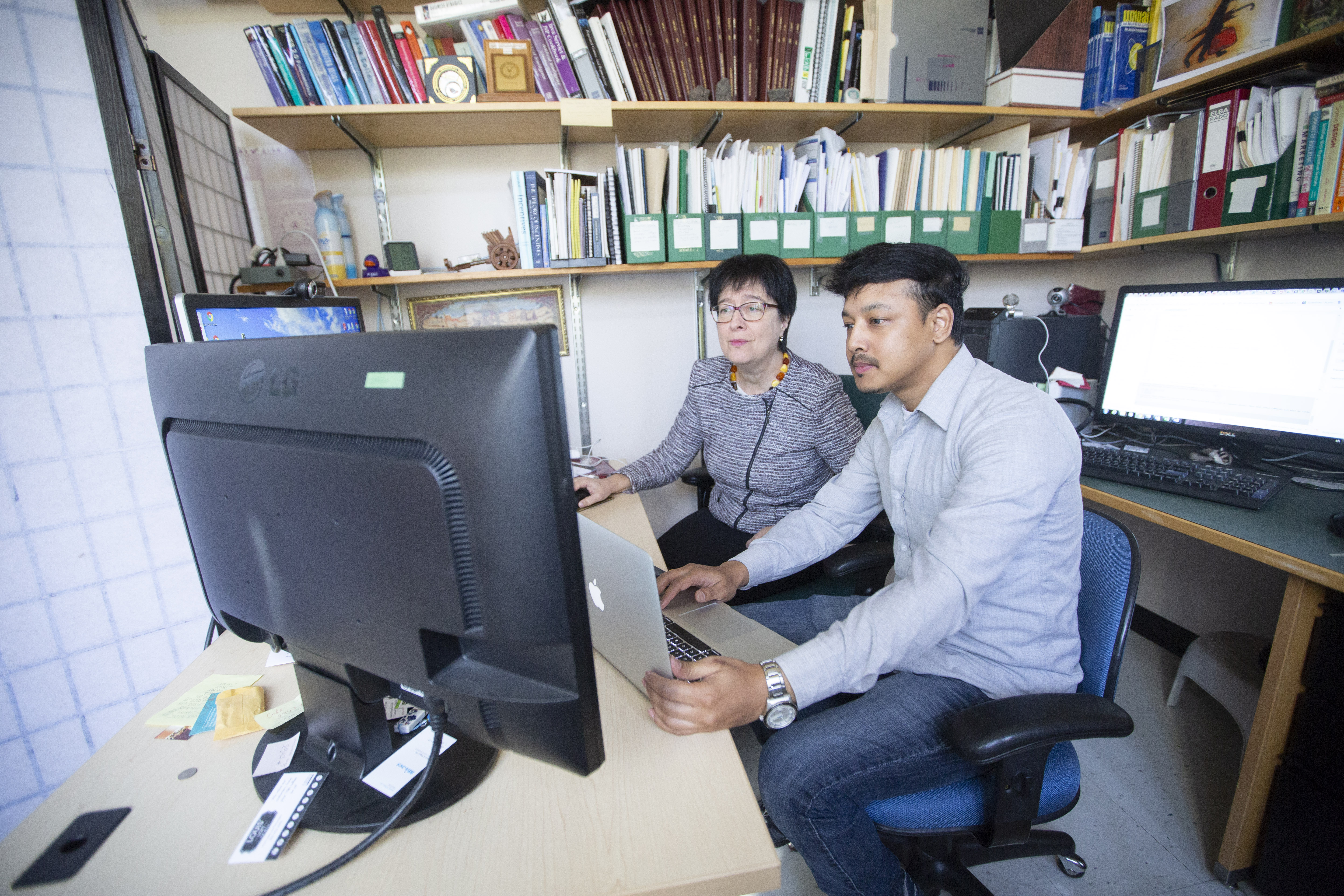 Ajay Shrestha (right) and Julita Vassileva’s work ensures online privacy. (Photo credit: Dave Stobbe for the University of Saskatchewan).
